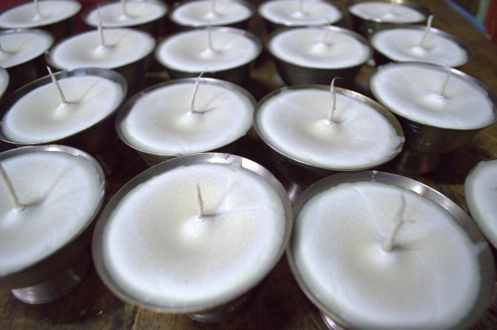 Butter candles aligned in rows.